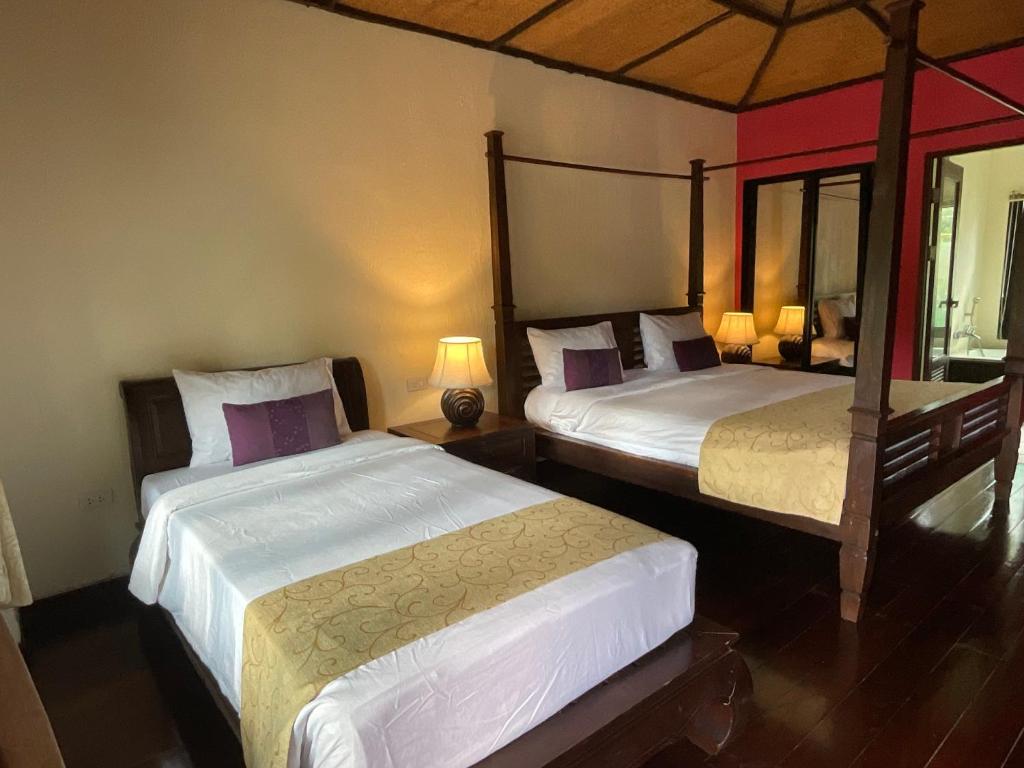 Postel nebo postele na pokoji v ubytování Seashell Resort Koh Tao-SHA Plus