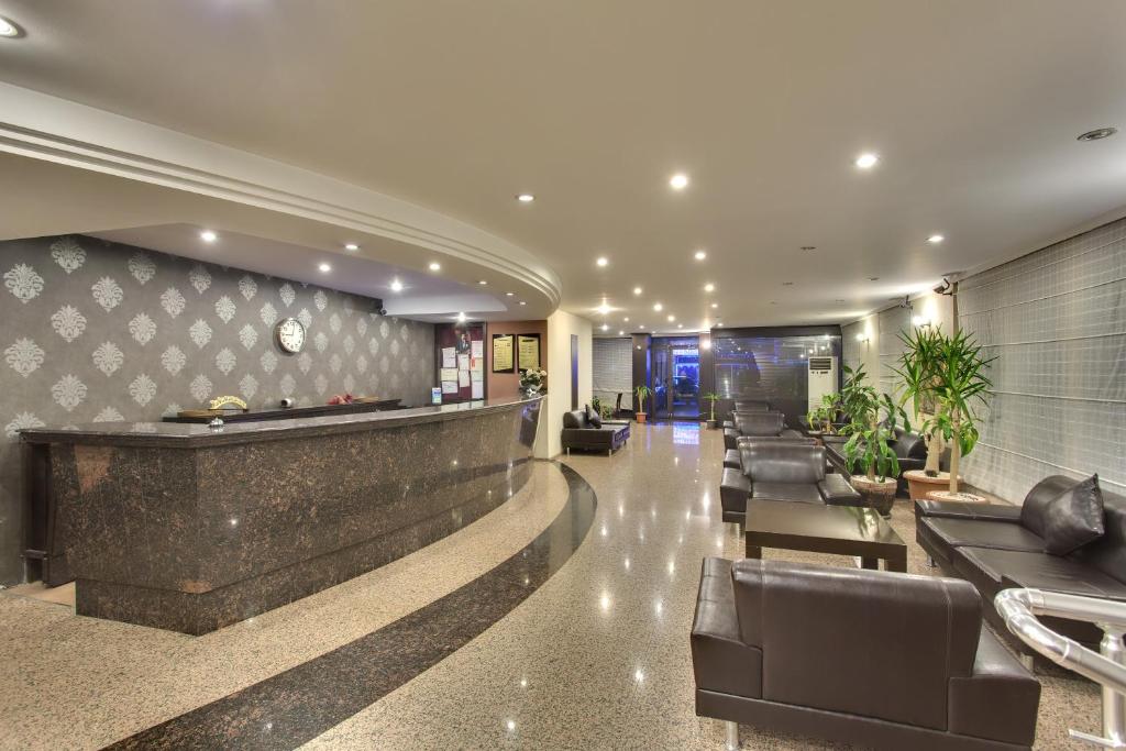 Χώρος καθιστικού στο Antroyal Hotel