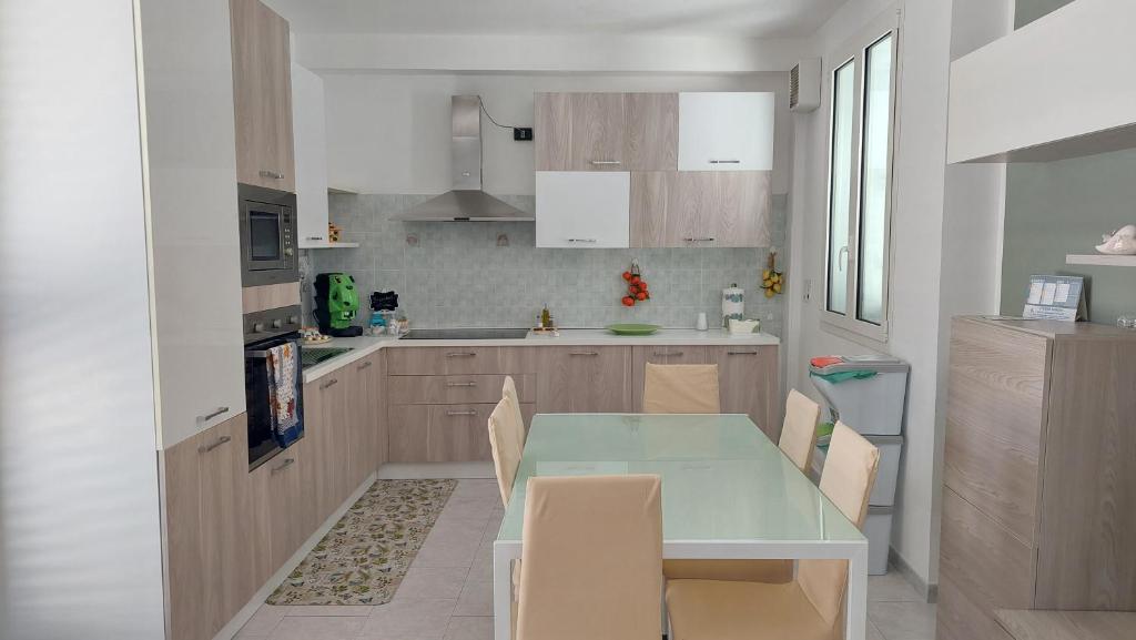 Kuchyň nebo kuchyňský kout v ubytování Terrazza Bianca