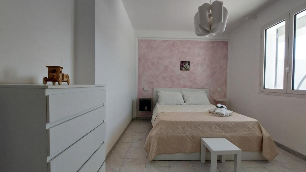 Postel nebo postele na pokoji v ubytování Terrazza Bianca