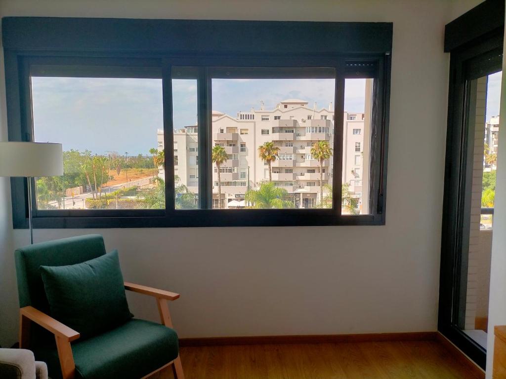 A seating area at Apartamento Málaga Litoral Beach II