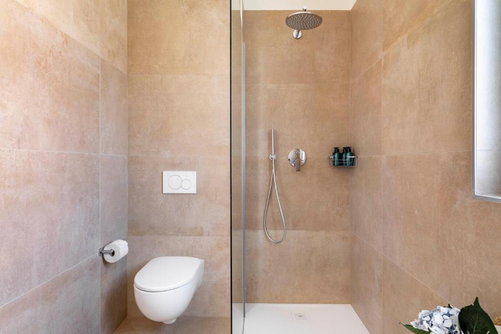 Koupelna v ubytování Regalia Suites - Free Parking