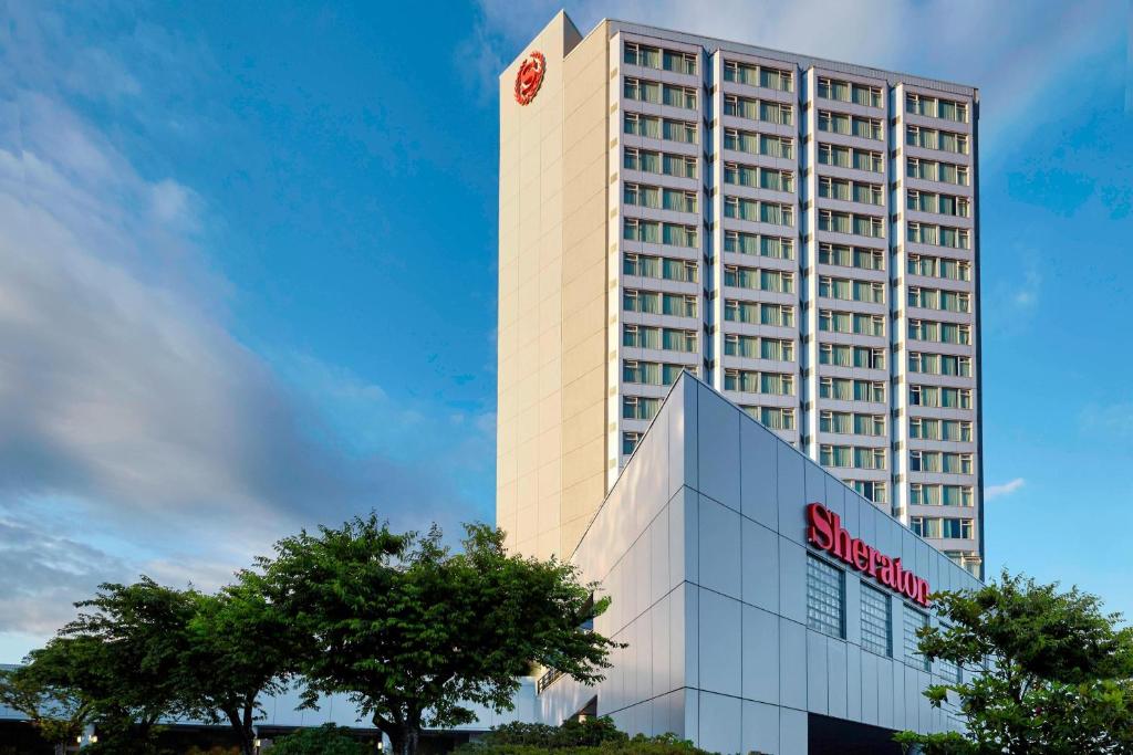 a tall building with a samsung sign on it at Sheraton Vancouver Guildford Hotel in Surrey