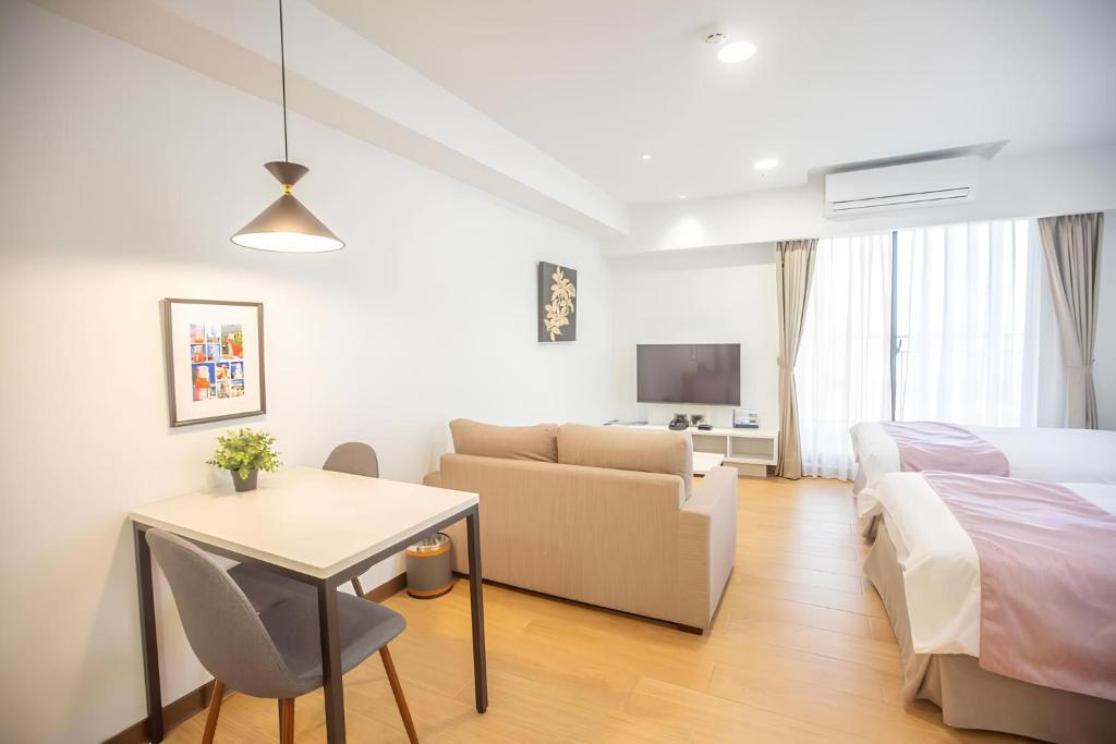 Postel nebo postele na pokoji v ubytování 金金禮寓Solis hotel