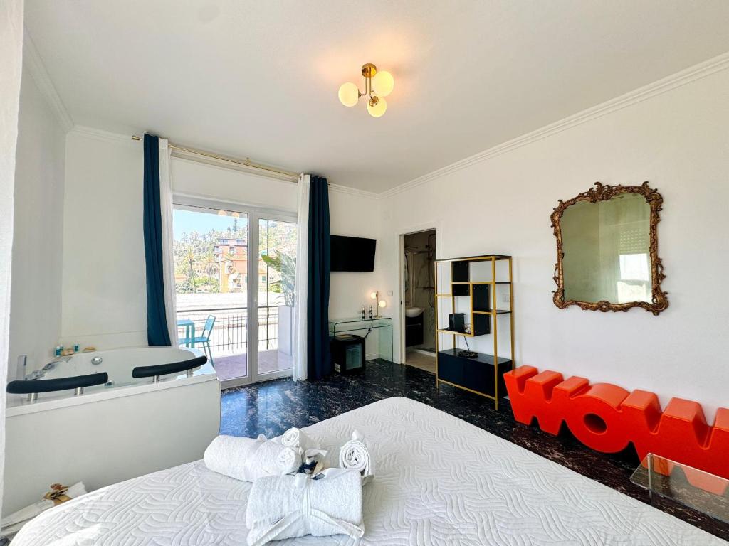 Postel nebo postele na pokoji v ubytování New Seaside Suite GOLD