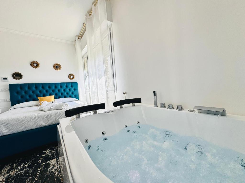 Postel nebo postele na pokoji v ubytování New Seaside Suite GOLD
