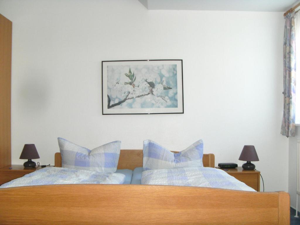 Postel nebo postele na pokoji v ubytování Hotel Kiek ut