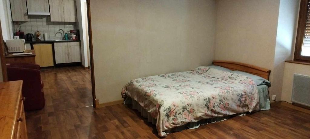 Postel nebo postele na pokoji v ubytování Appartements au bord de la rivière