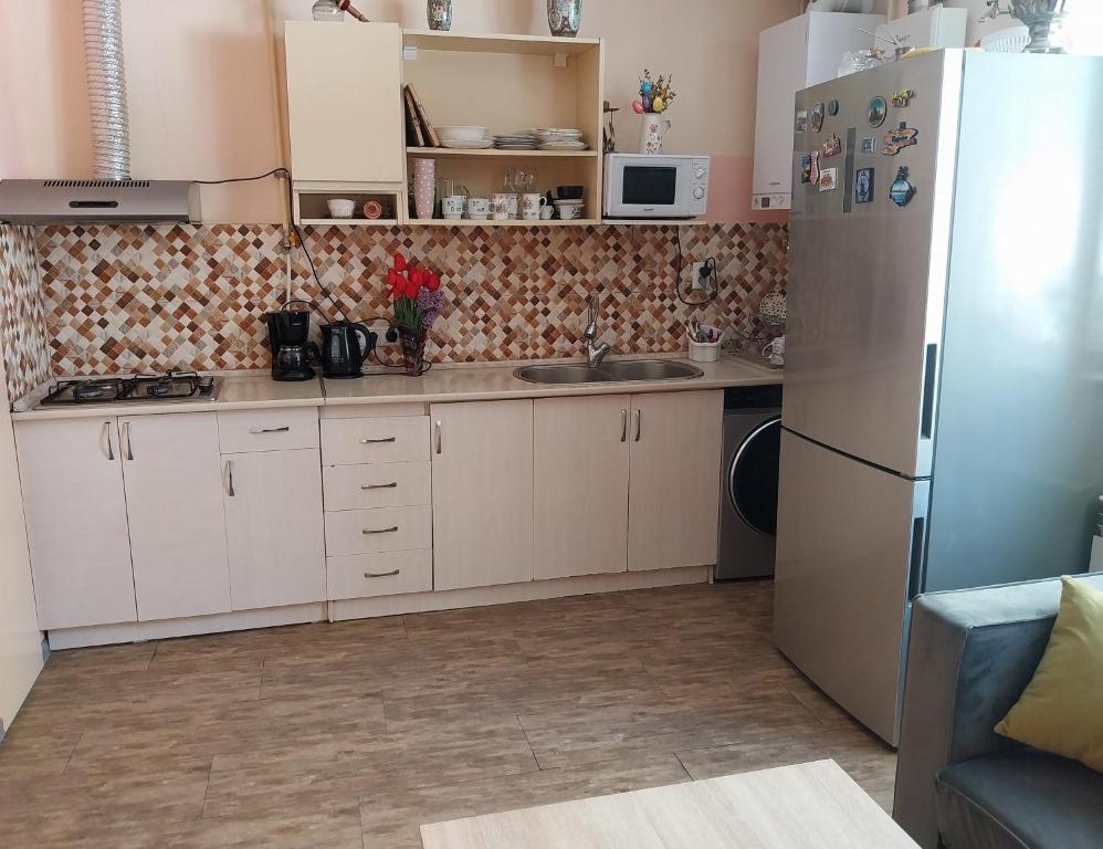 Kuchyň nebo kuchyňský kout v ubytování Like Home Guesthouse & Tours