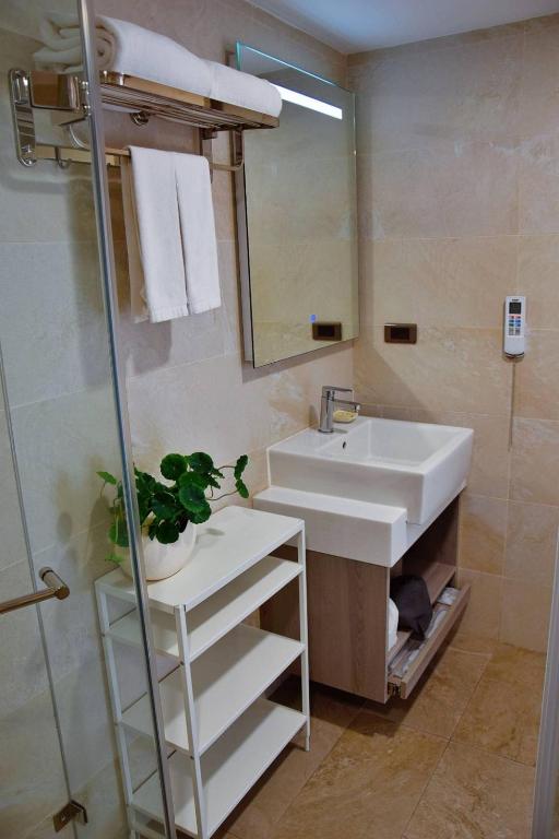 Koupelna v ubytování 金金禮寓Solis hotel