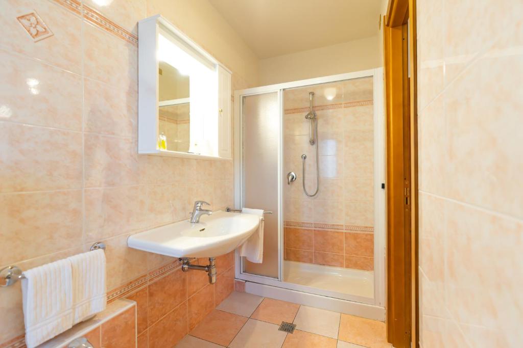 Koupelna v ubytování Hotel Belvedere Wellness&SPA