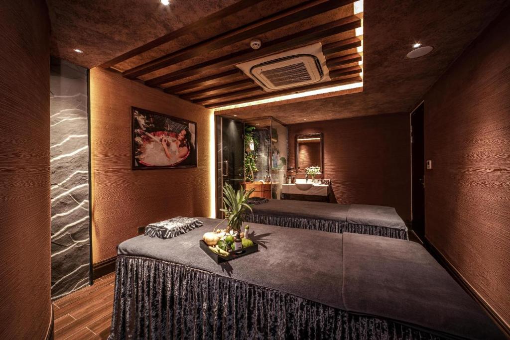 Postel nebo postele na pokoji v ubytování Hanoi Lion Boutique Hotel & Spa