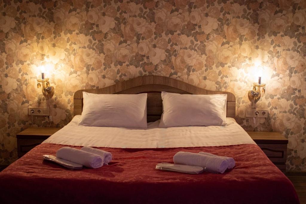 Postel nebo postele na pokoji v ubytování Planet kazbegi