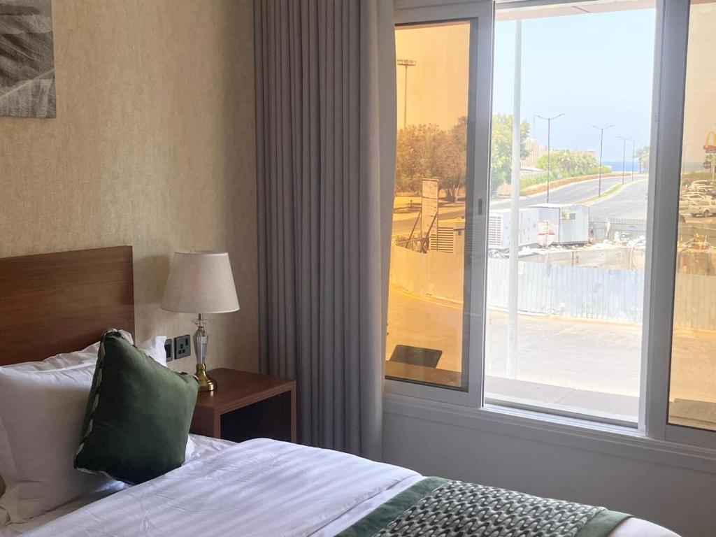 Postel nebo postele na pokoji v ubytování سويت بارك جدة - Suite Park Jeddah