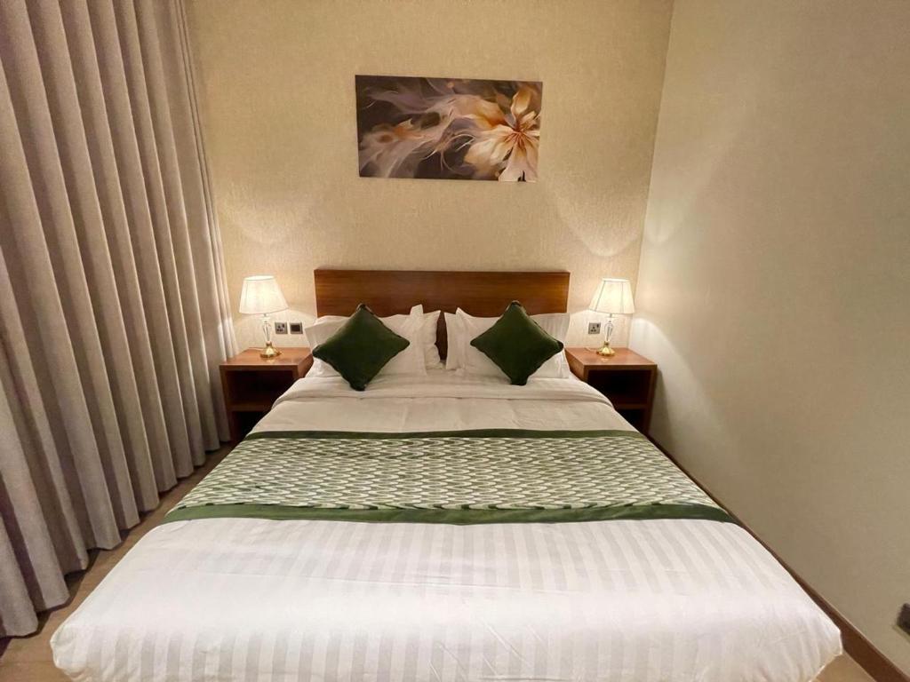 Postel nebo postele na pokoji v ubytování سويت بارك جدة - Suite Park Jeddah