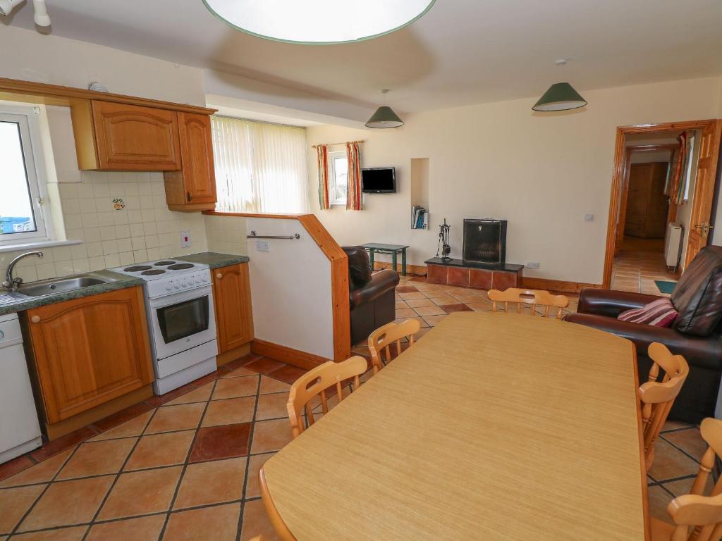 Kuchyň nebo kuchyňský kout v ubytování No 5 Beach Cottages