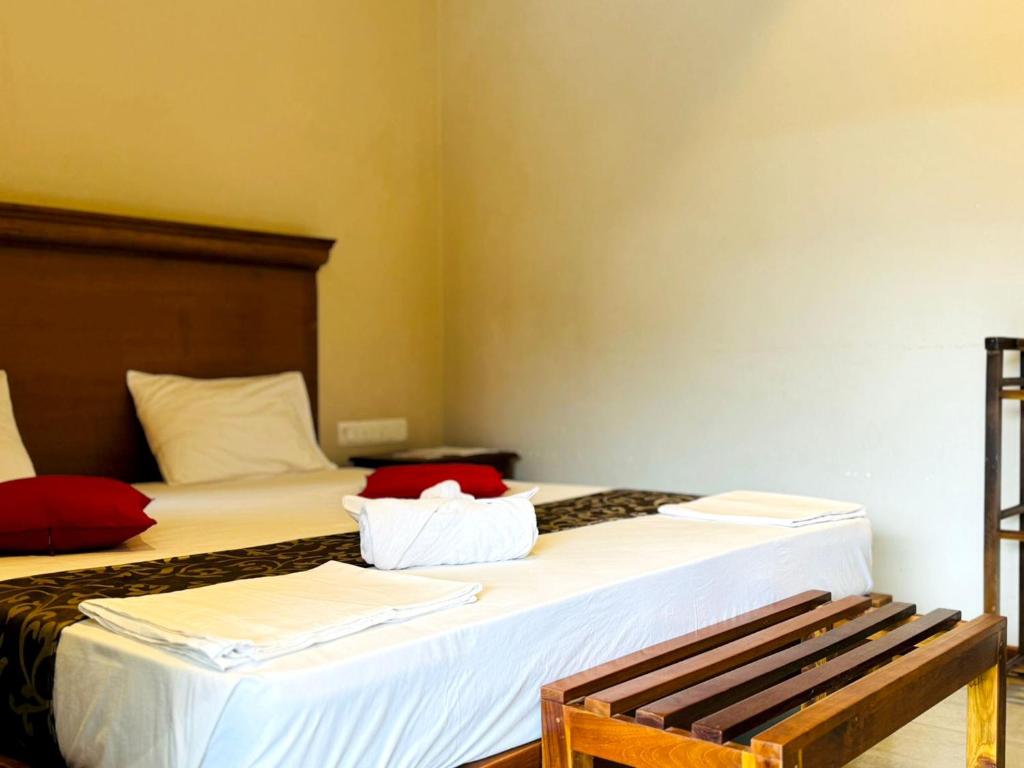 Postel nebo postele na pokoji v ubytování Rivorich Residence Kandy