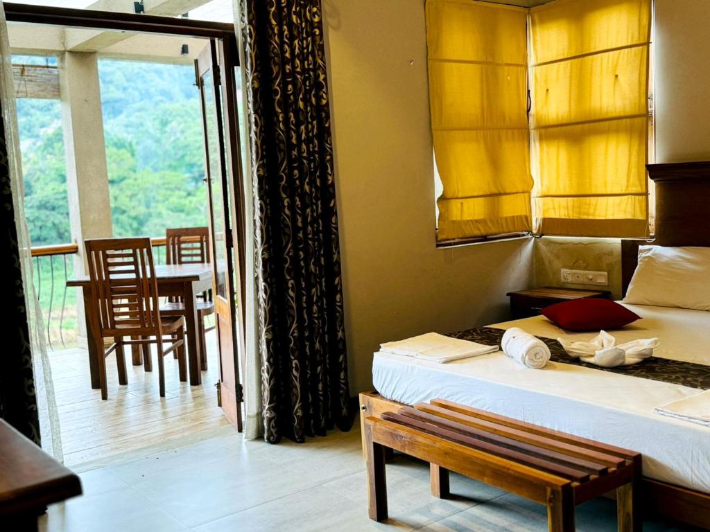 Postel nebo postele na pokoji v ubytování Rivorich Residence Kandy