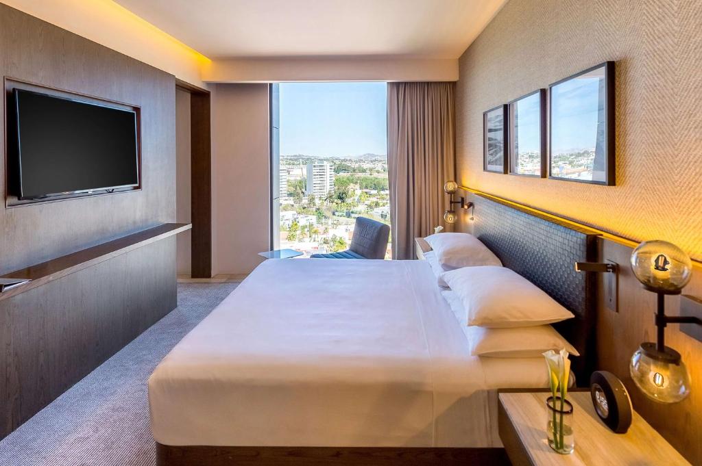 Postel nebo postele na pokoji v ubytování Hyatt Regency Andares Guadalajara