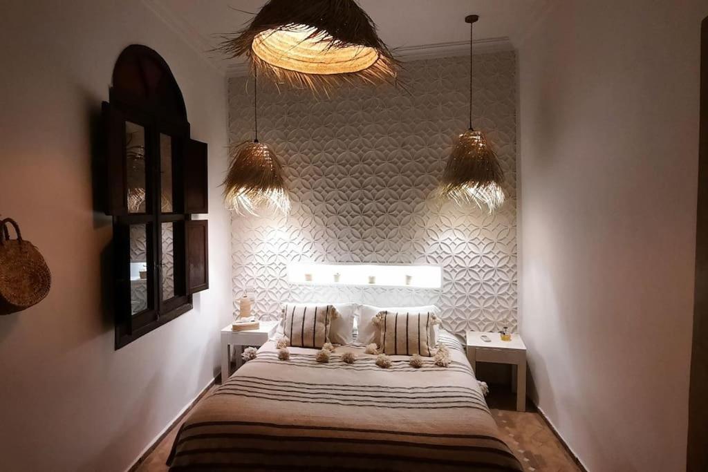 Postel nebo postele na pokoji v ubytování Riad Cosy