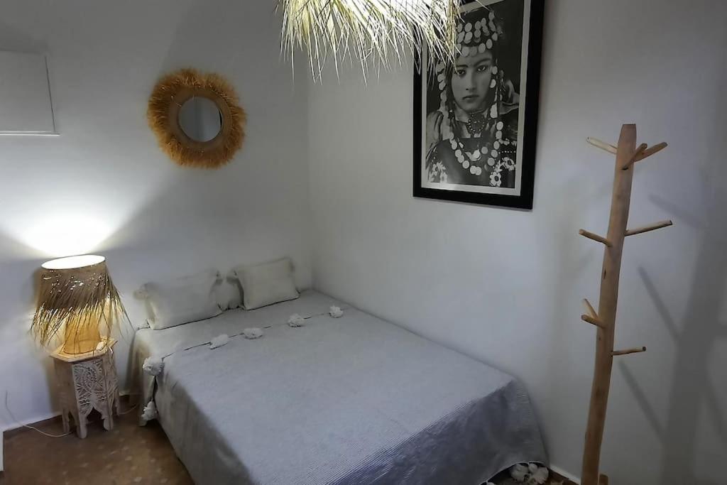 Postel nebo postele na pokoji v ubytování Riad Cosy