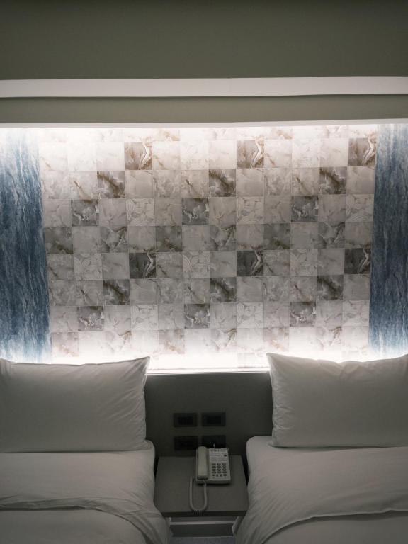 Posezení v ubytování 新仕飯店-New City Hotel