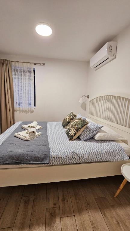 Posteľ alebo postele v izbe v ubytovaní Guesthouse Augusta Insula