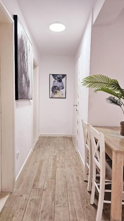 Televízia a/alebo spoločenská miestnosť v ubytovaní Guesthouse Augusta Insula