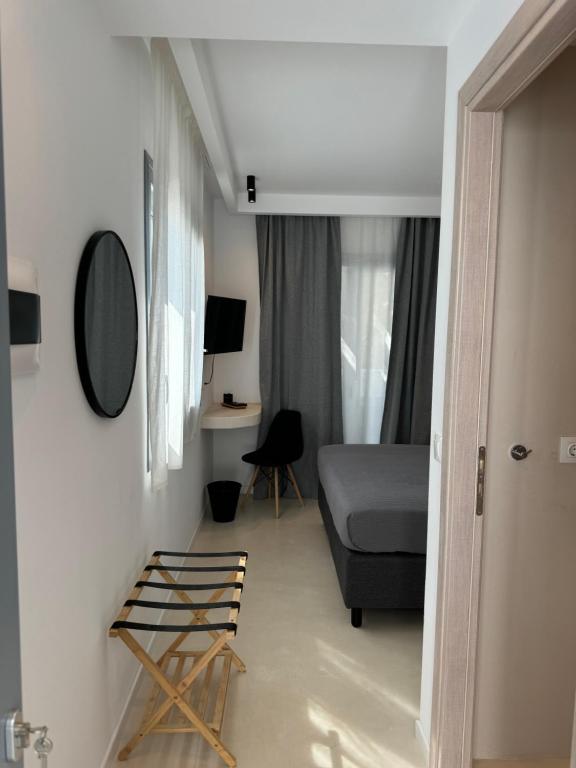 TV a/nebo společenská místnost v ubytování Angelo Estate Santorini