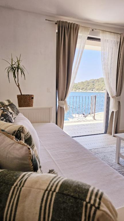 Posteľ alebo postele v izbe v ubytovaní Guesthouse Augusta Insula