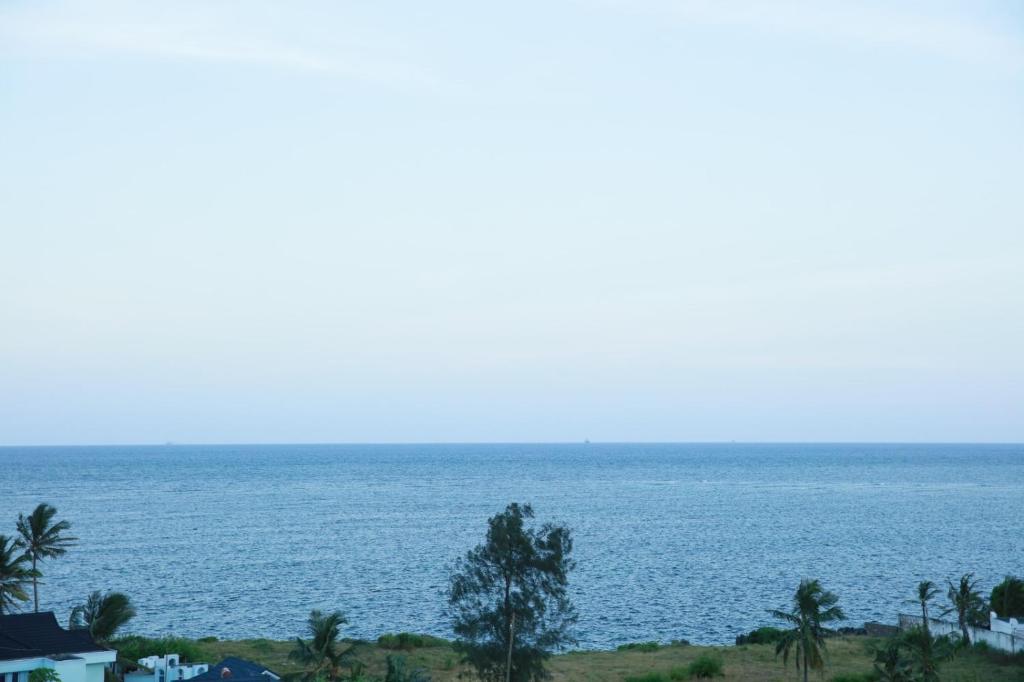 a view of a large body of water at NYALI-HOMESTAY BEACH VIEW ROOMs AND APARTMENT WITH SWIMMING POOL in Mombasa