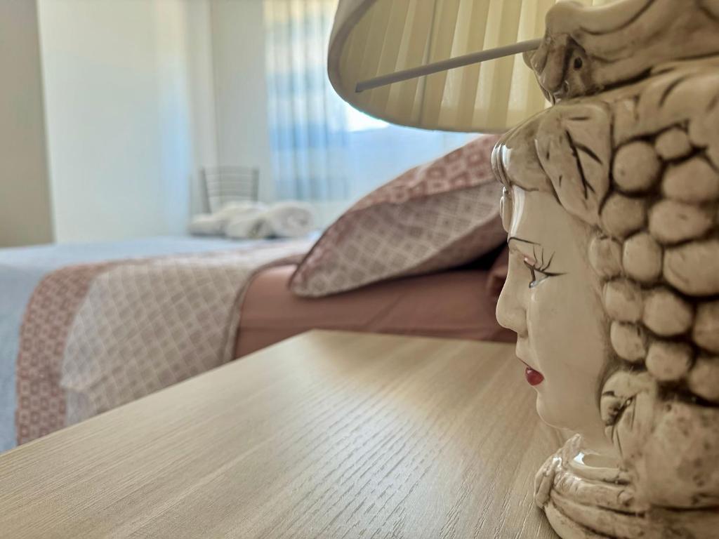 Posteľ alebo postele v izbe v ubytovaní Casa Gio - Appartamenti Vacanze
