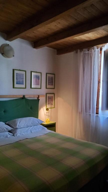 Postel nebo postele na pokoji v ubytování Villa Marinella