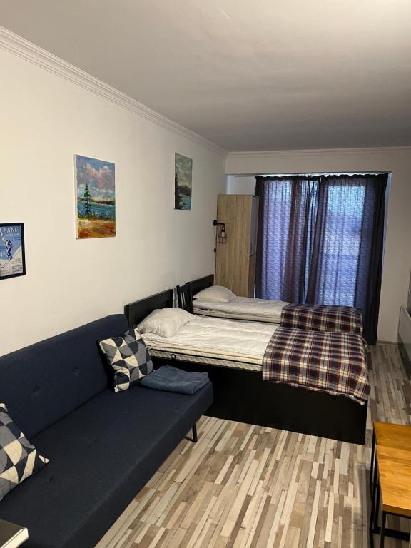 Postel nebo postele na pokoji v ubytování Gudauri loft Apartment 509