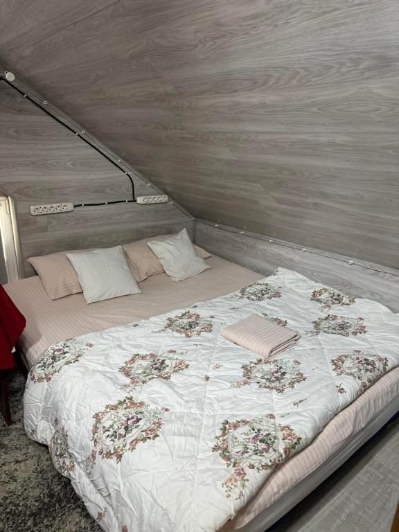 a bedroom with a bed in a tent at Не дорогой отель in Chişinău