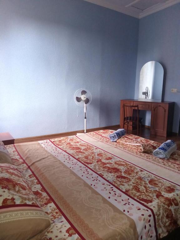 Postel nebo postele na pokoji v ubytování Guest house Gio