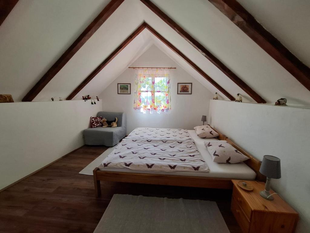Posteľ alebo postele v izbe v ubytovaní Country House Na Malenom brijegu