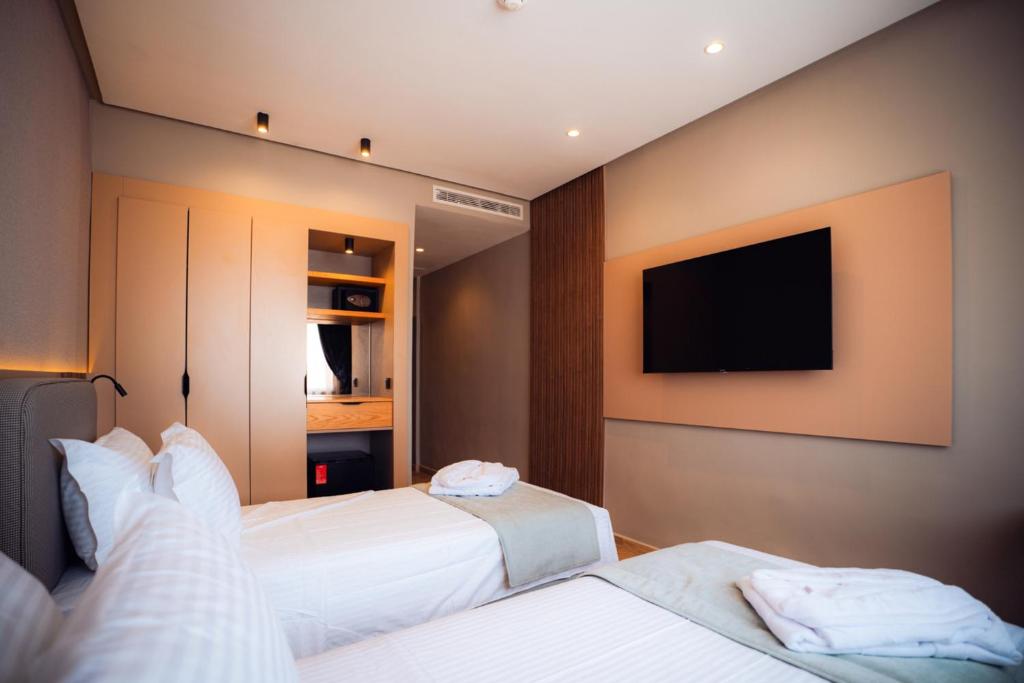 Postel nebo postele na pokoji v ubytování Elite View Hotel Dakhla