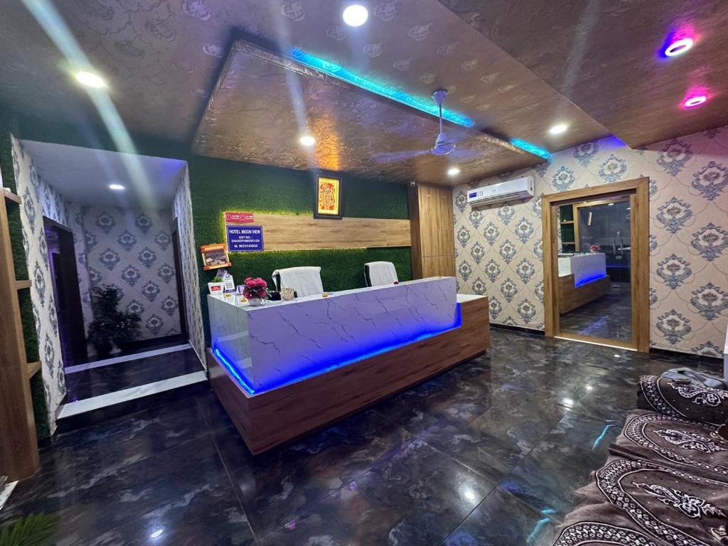TV a/nebo společenská místnost v ubytování Hotel Moon View