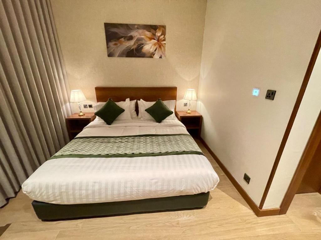 Postel nebo postele na pokoji v ubytování سويت بارك جدة - Suite Park Jeddah