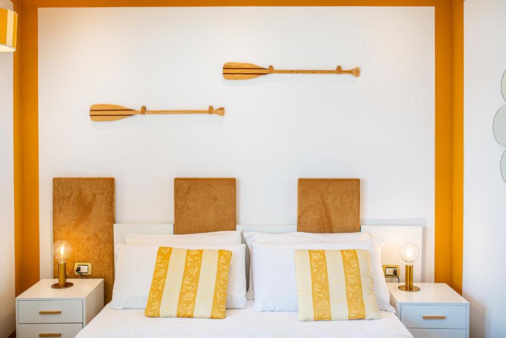 Postel nebo postele na pokoji v ubytování Hotel Karinzia