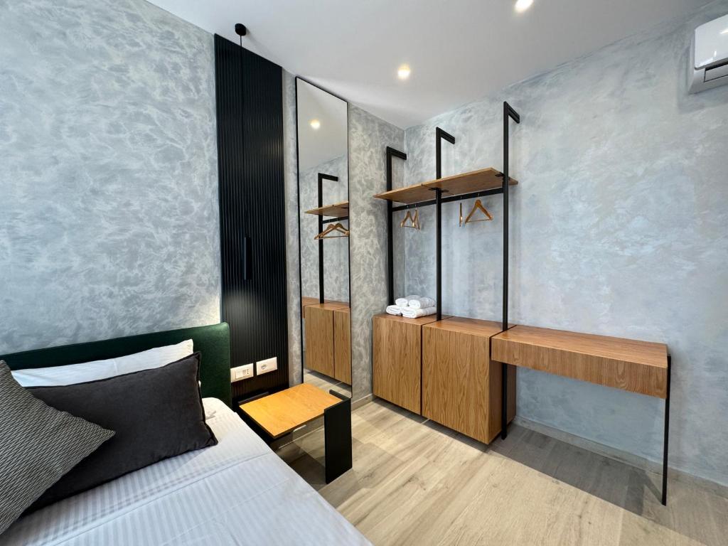 Postel nebo postele na pokoji v ubytování Twins Hotel Vlore