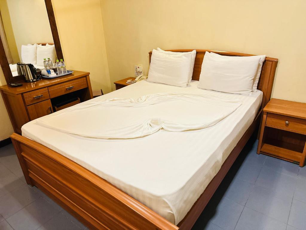 Postel nebo postele na pokoji v ubytování Gamodh Citadel Resort