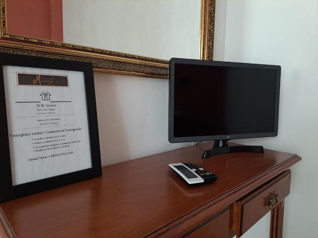 TV a/nebo společenská místnost v ubytování Hostal Montys