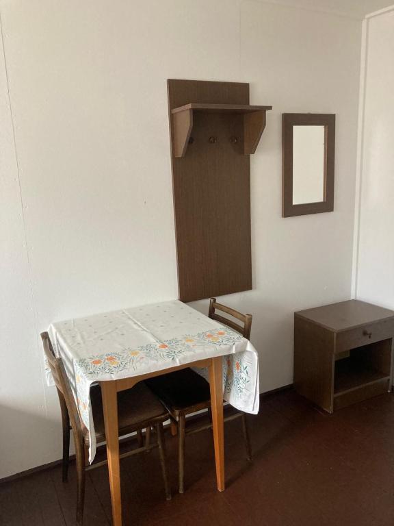 Postel nebo postele na pokoji v ubytování Churáňov Chatičky