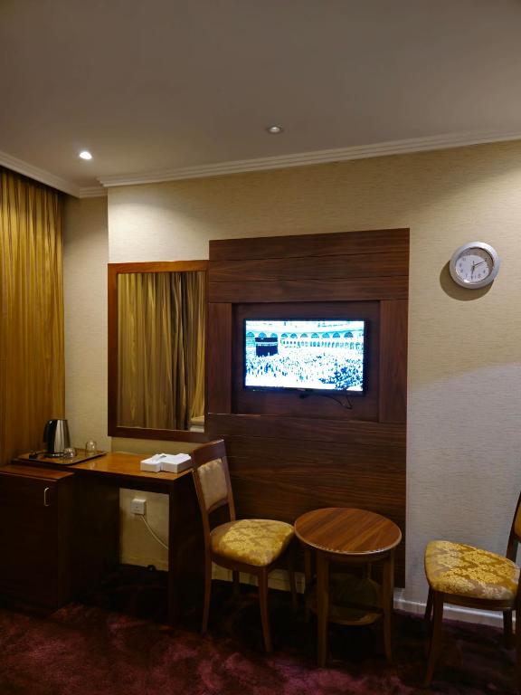 TV a/nebo společenská místnost v ubytování Diouf Al Maqam Hotel 3