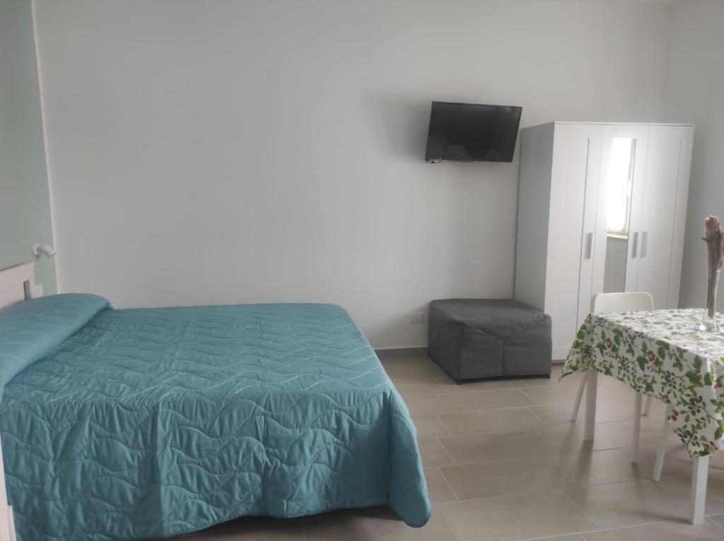 Postel nebo postele na pokoji v ubytování Cirella House