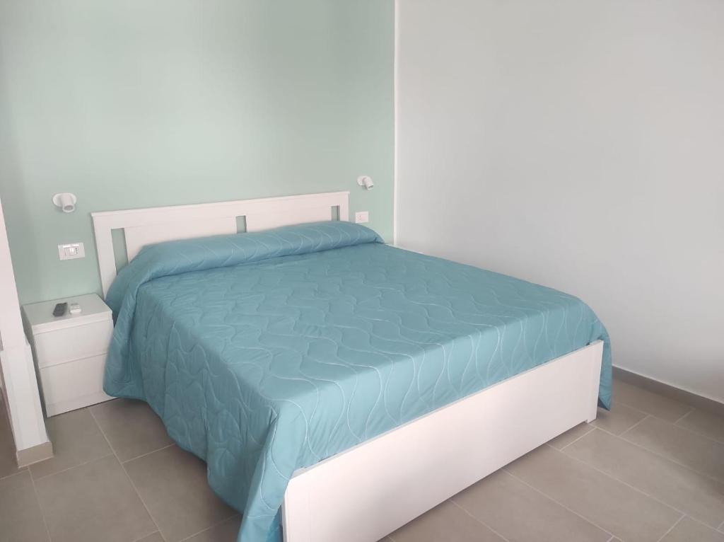 Postel nebo postele na pokoji v ubytování Cirella House