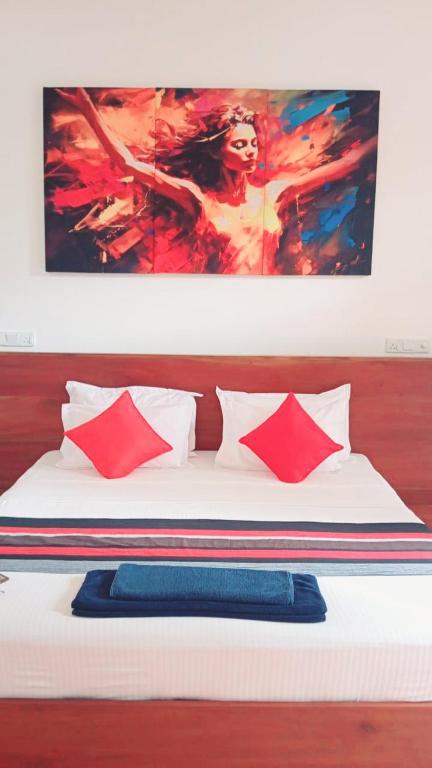 Postel nebo postele na pokoji v ubytování Hemalie Resort Mirissa