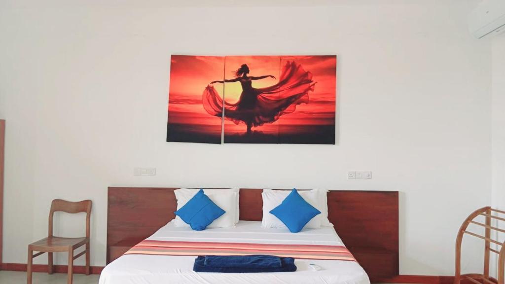 Postel nebo postele na pokoji v ubytování Hemalie Resort Mirissa